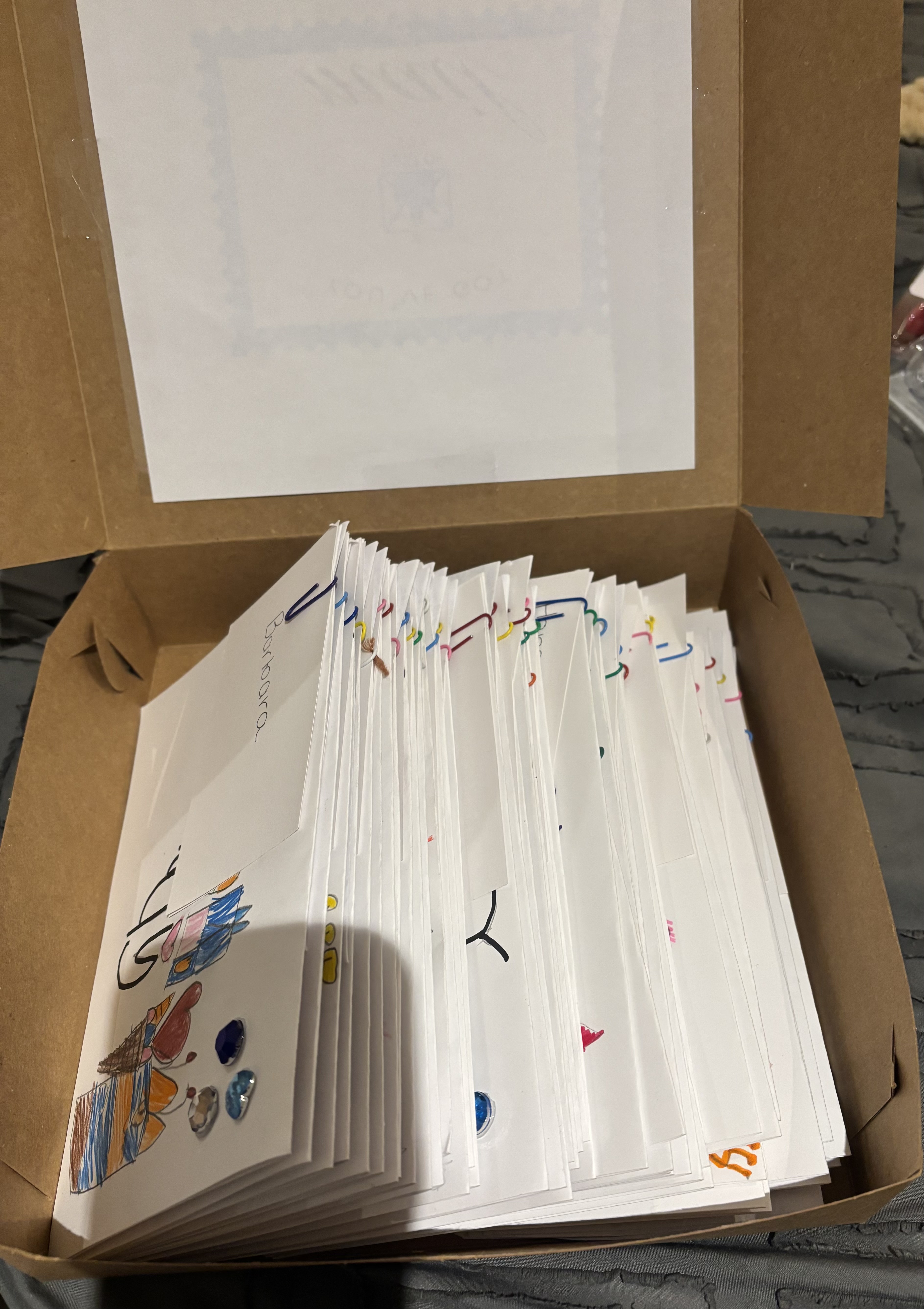A birthday box filled with handmade cards ready for delivery.